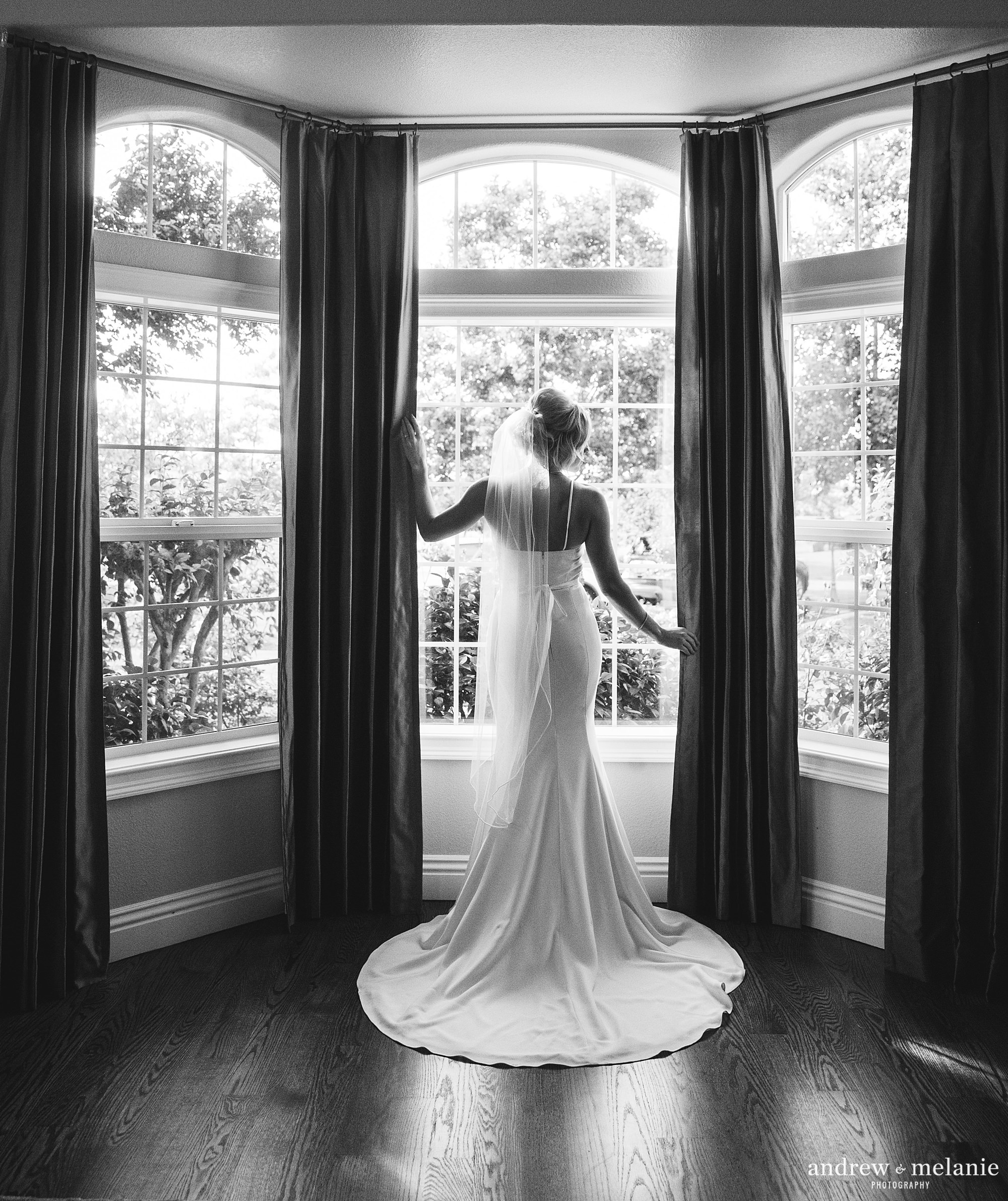 Wolfe Heights Event Center in Sacramento, CA. Black and white photo of bride in bridal room