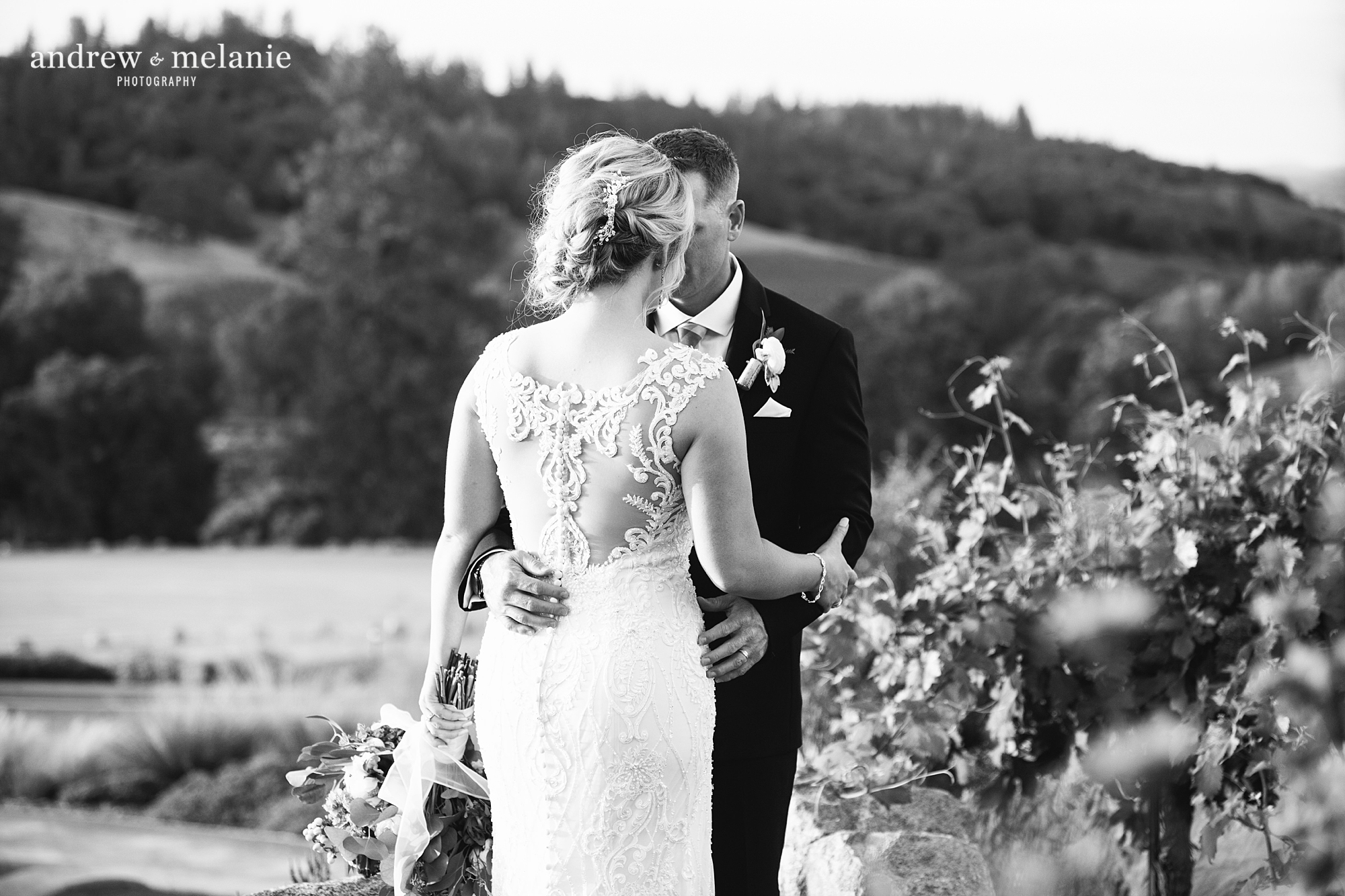 black and white photo of bride and groom by Andrew and Melanie Photography